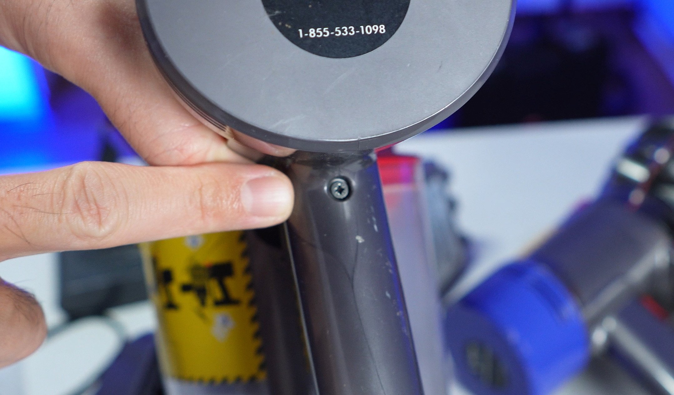 Dyson V7 bolt behind handle