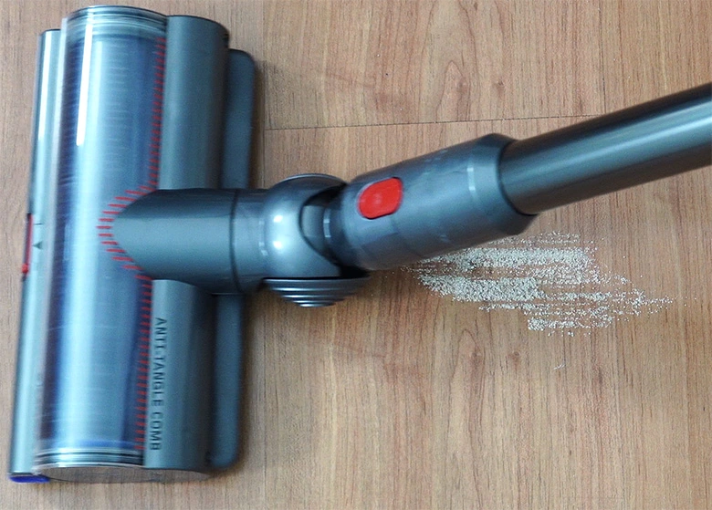 Sand trail after a forward pass with a bristled brush tool